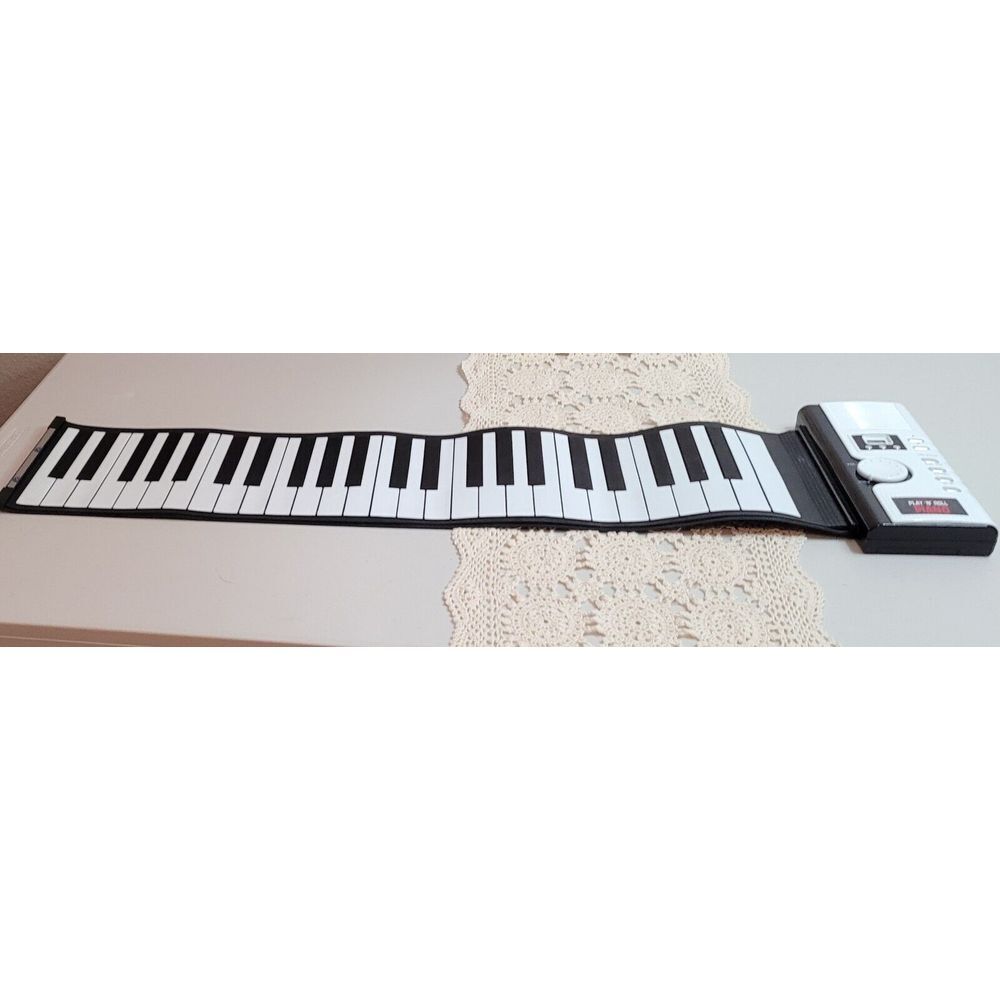 The Sharper Image Play 'N' Roll Digital Piano With Storage Case 49 Keys 99 tones